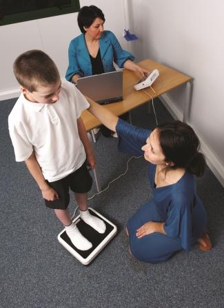 A boy being weighed as part of the National Child Measurement Programme.