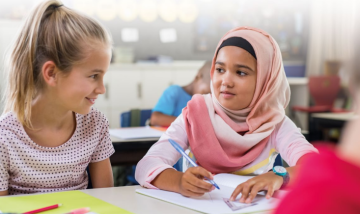 two young children talking