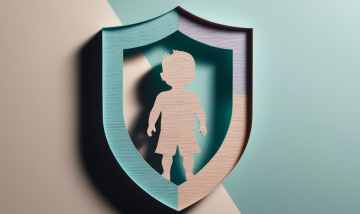 Shield with silhouette of a child inside