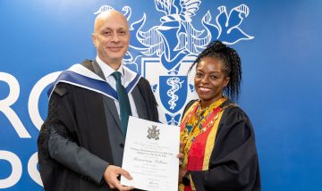 Prof. Al-Uzri receiving his Honorary Fellowship certificate from Royal College of Psychiatrists President Dr. Lade Smith.