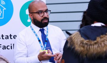 Man offering careers advice at event