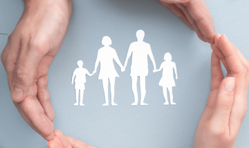 hands with white family picture in middle