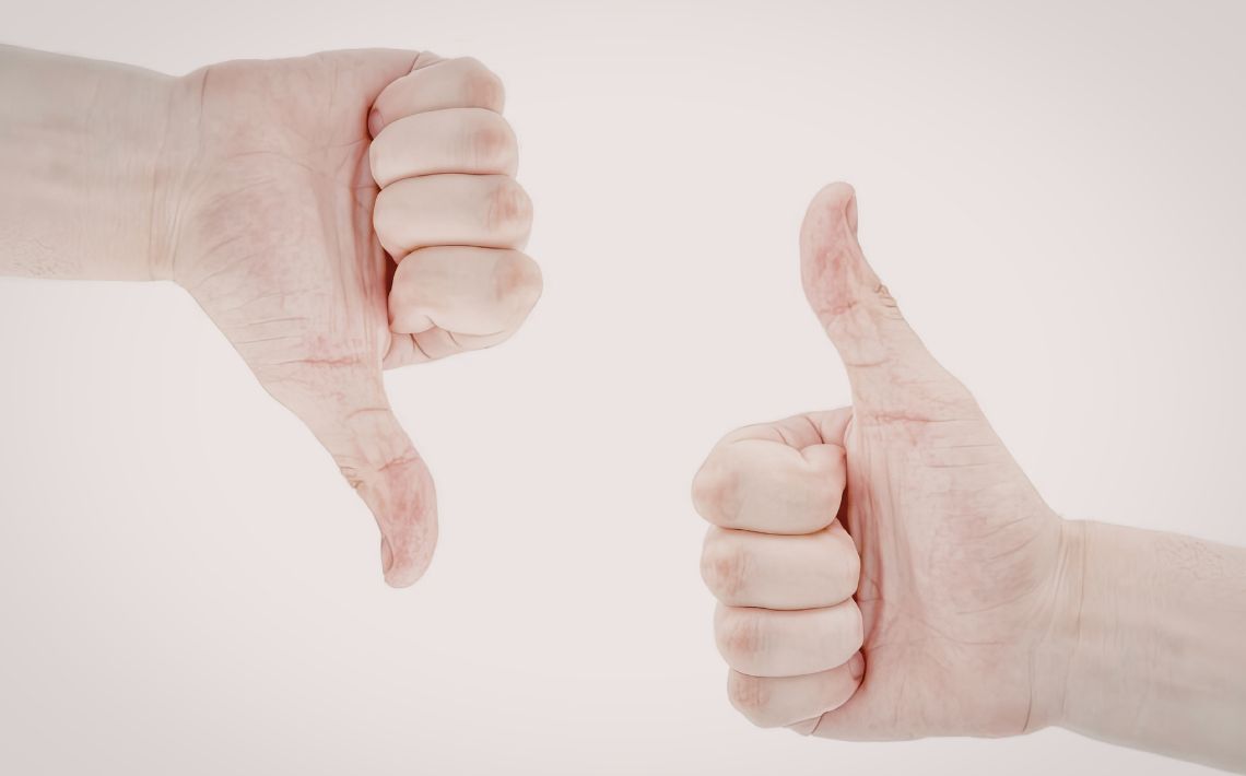 photo of thumbs up and thumbs down