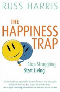 The Happiness Trap by Russ Harris book cover.